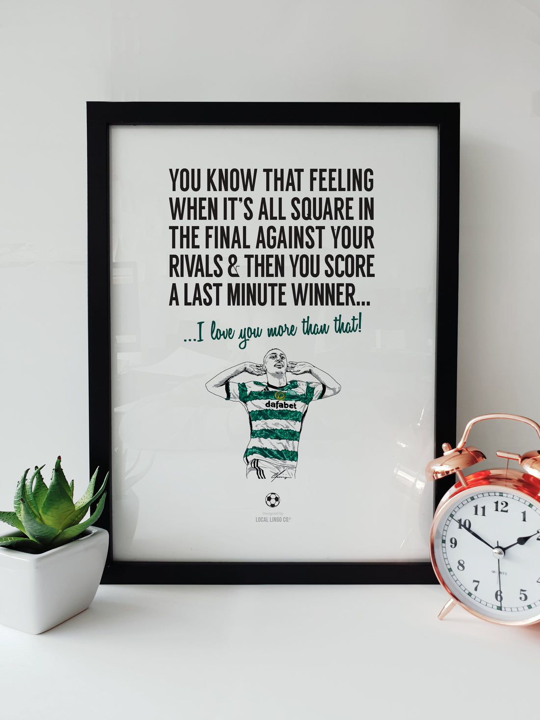 Last Minute Winner - Adam Idah's Goal - Celtic vs. Rangers Scottish Cup Final Print by Local Lingo, featuring a jubilant Adam Idah and bold text celebrating a dramatic victory, in a black frame.