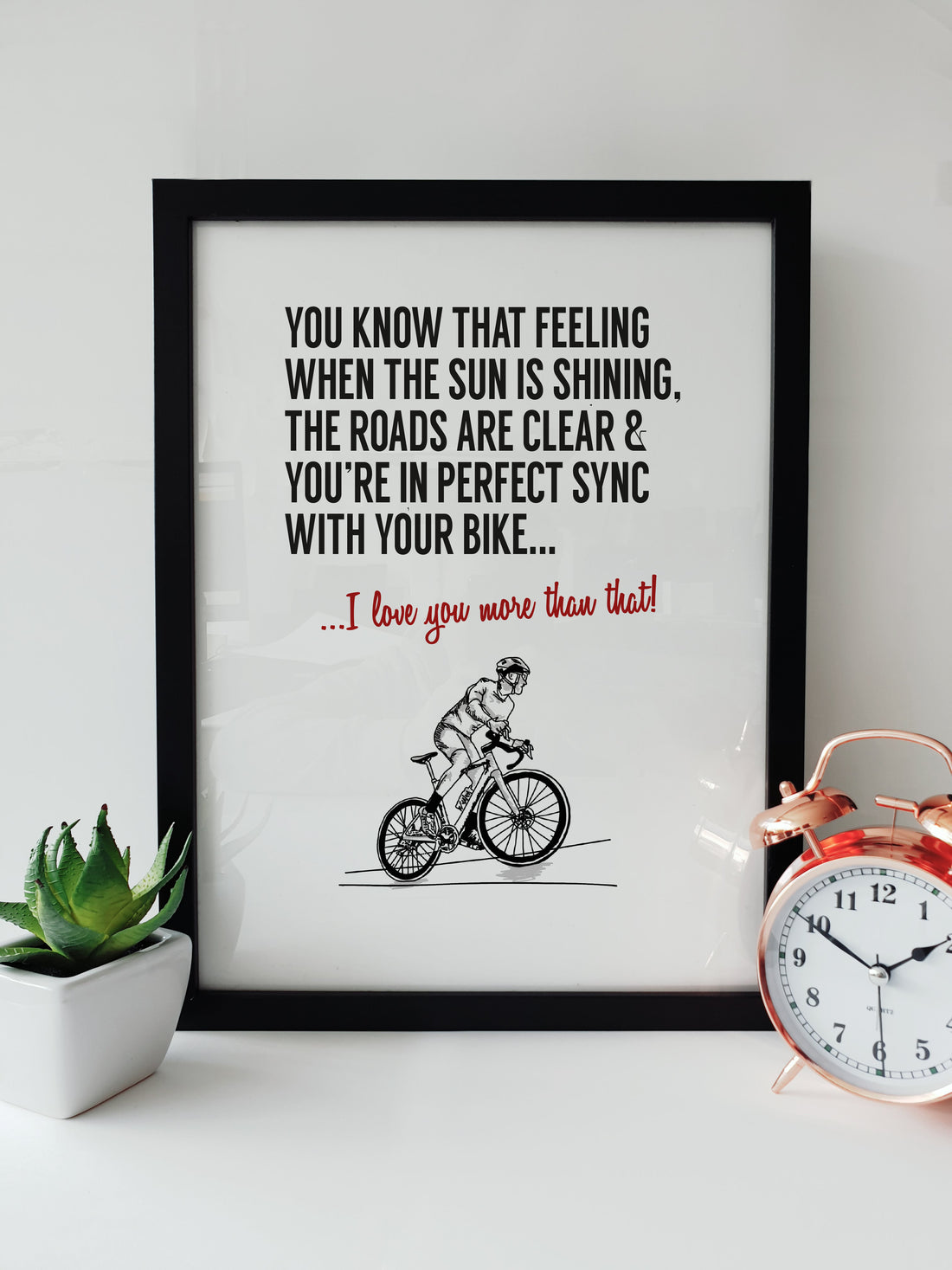 Art print of a cyclist in sync with their bike on a sunny day, hand-drawn illustration, ideal for cycling enthusiasts. designed by local lingo