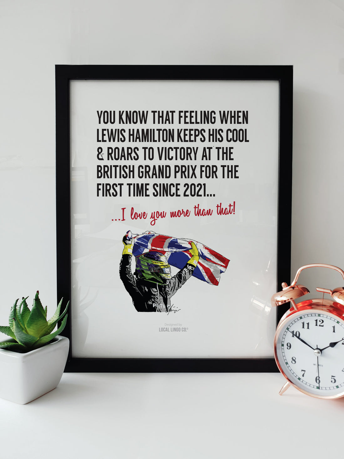 Lewis Hamilton British Grand Prix Victory 2024 Formula 1 Fan Artwork by Local Lingo, featuring an illustration of Hamilton celebrating with the Union Jack and bold text in a black frame.