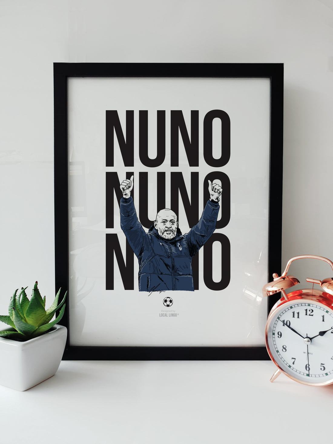 Hand-drawn illustration of Nottingham Forest manager Nuno Espírito Santo celebrating, with bold "Nuno, Nuno, Nuno" text, designed by Local Lingo. The artwork is displayed in a black frame, perfect for football fans and supporters of Nottingham Forest.