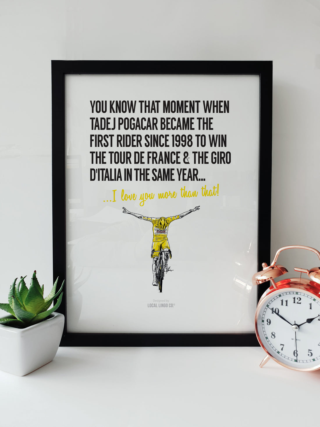 Tadej Pogačar Tour de France and Giro d'Italia Winner 2024 Cycling Fan Artwork by Local Lingo, featuring an illustration of Pogačar crossing the finish line in a black frame.