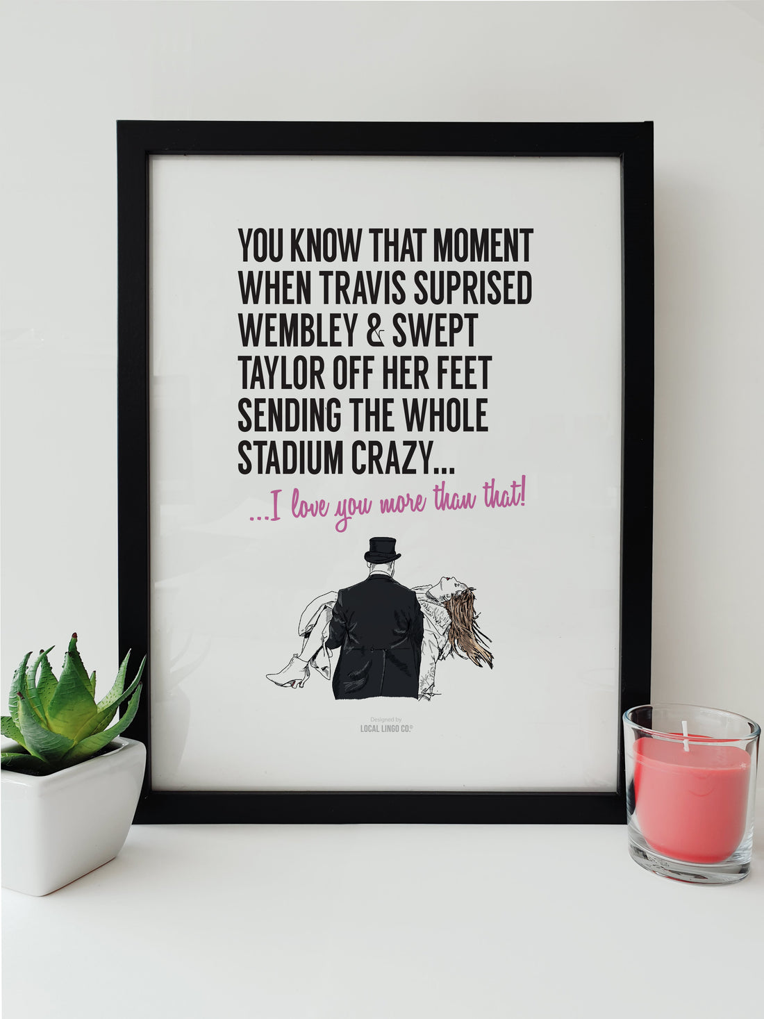 Travis and Taylor at Wembley Surprise Moment Fan Artwork by Local Lingo, featuring an illustration of Travis sweeping Taylor off her feet and bold text in a black frame.