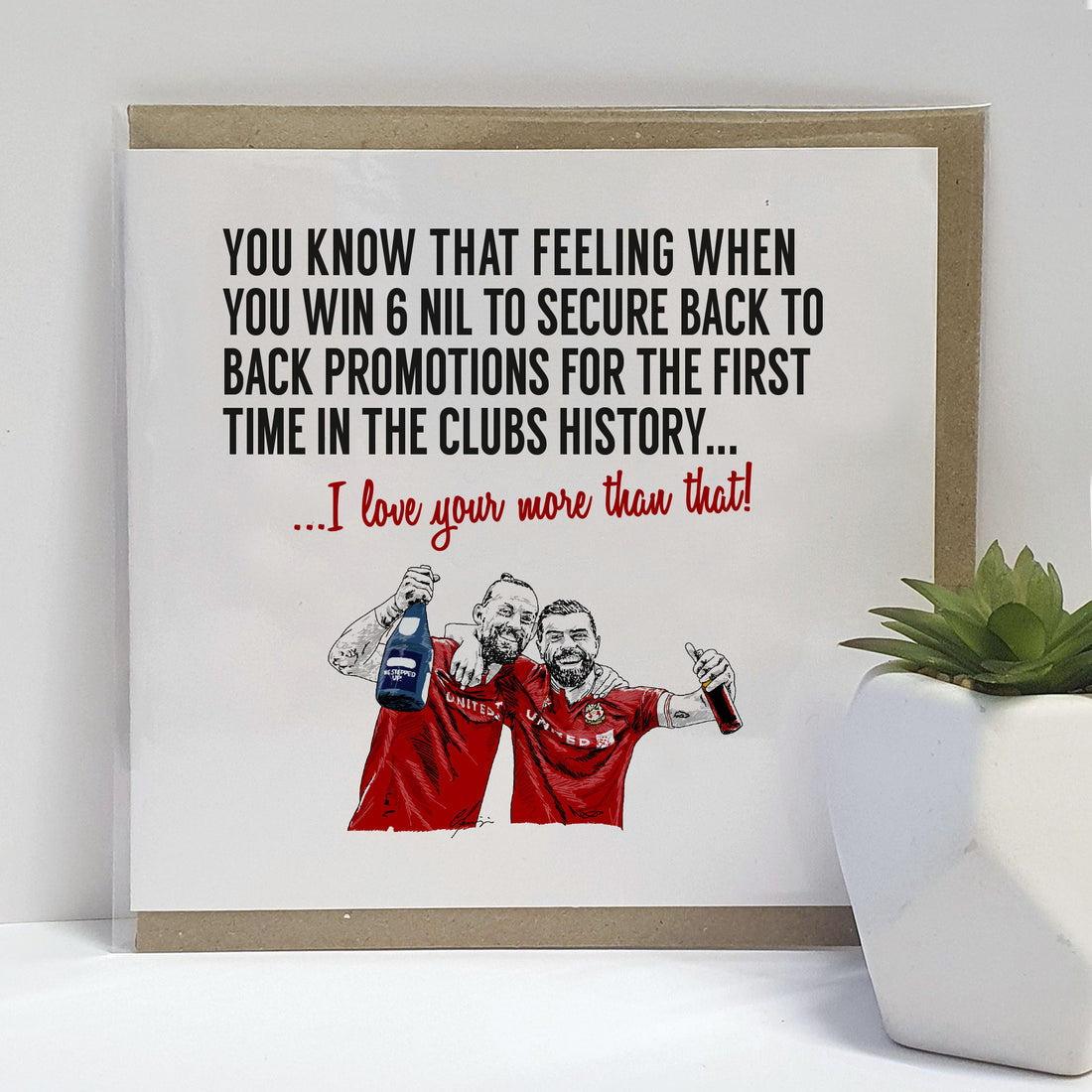 Illustrated Wrexham FC celebration card featuring players in post-victory cheer with a loving message, perfect for supporters celebrating the historic win. elliot lee and stephen fletcher