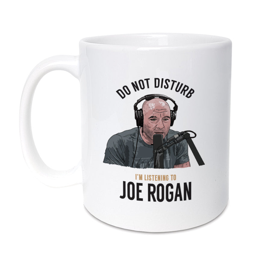 A unique mug featuring hand drawn illustration of Joe Rogan. It will make the perfect gift for Joe Rogan podcast fan. Whether it's for a birthday, Christmas or any other special occasion.    Mug reads: Do not disturb I'm listening to Joe Rogan 
