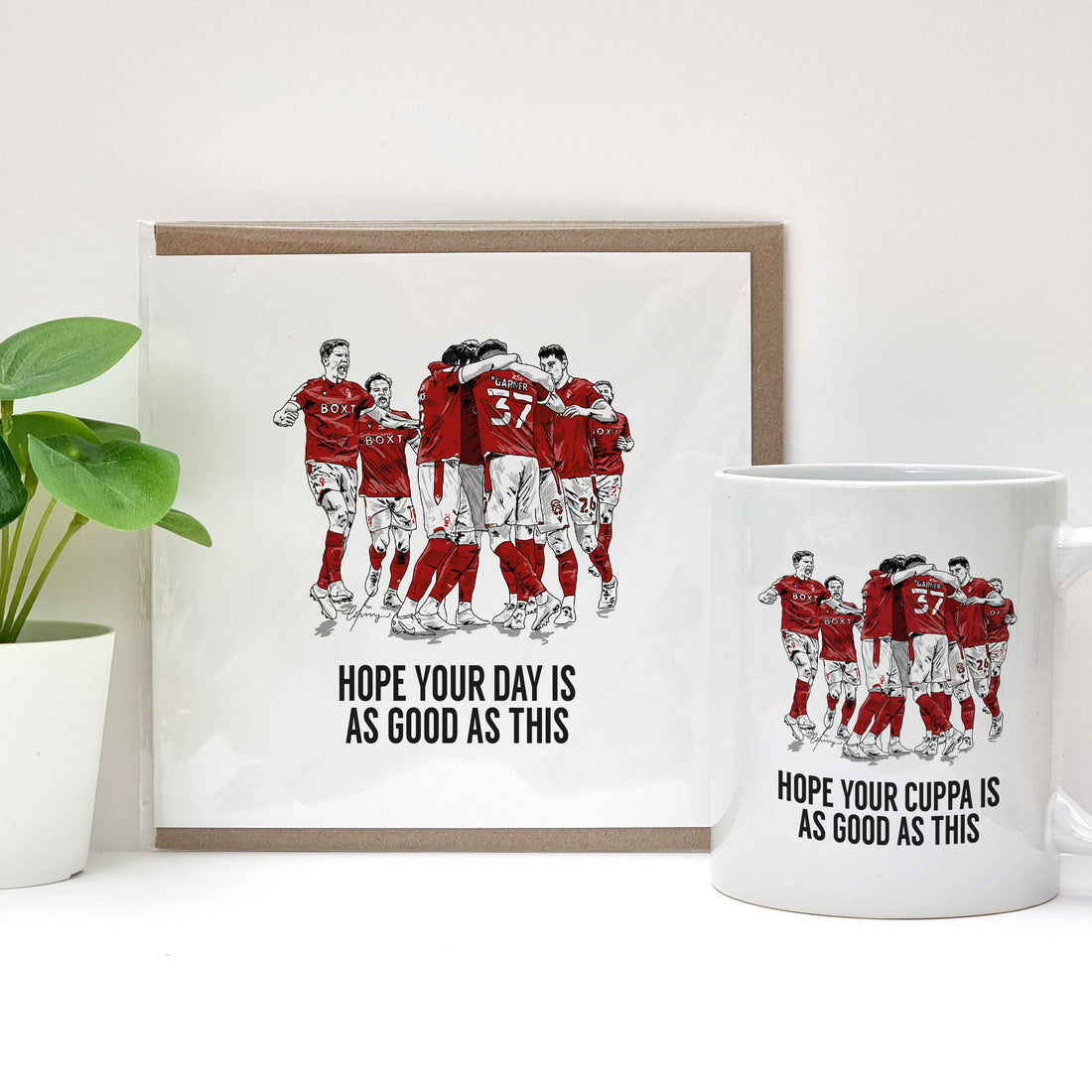 nottingham forest football club official greetings card and mug merchandise featuring an illustration of the players celebrating winning the championship play-off final and getting promoted to the premier league in 2022. Designed by a town called home